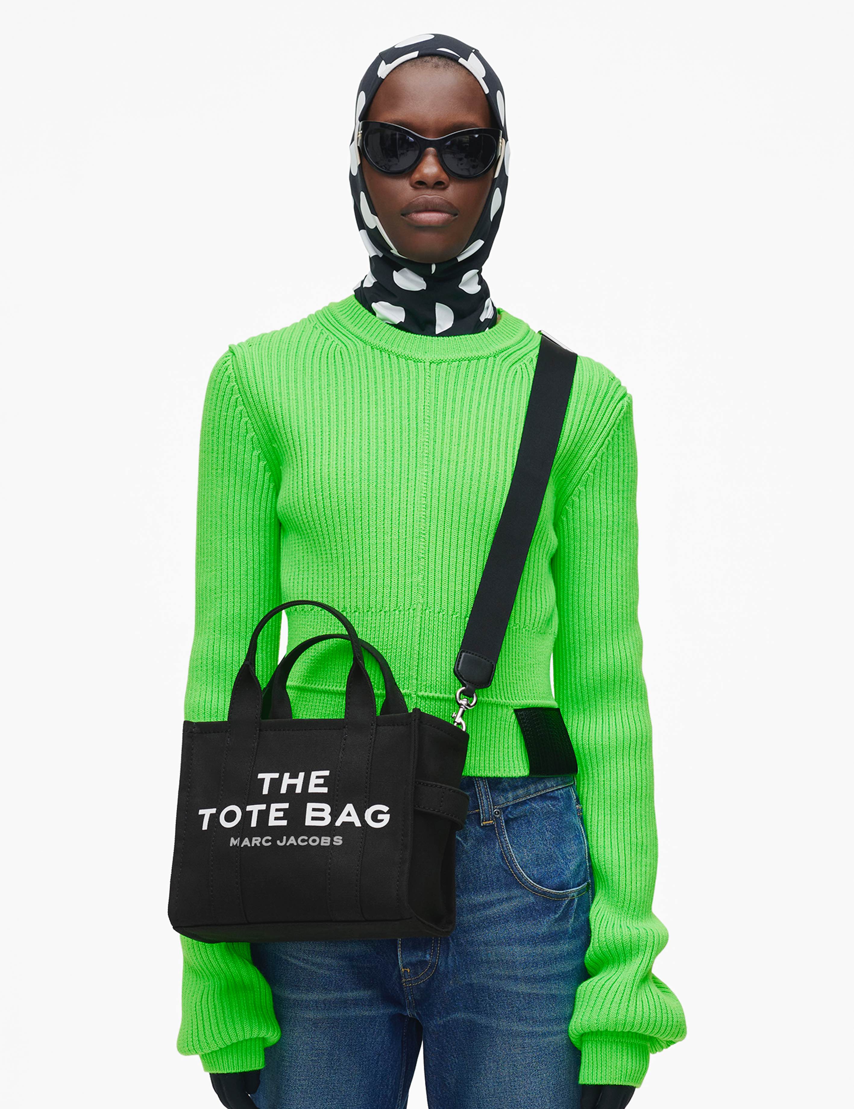 Marc offers Jacob tote bag